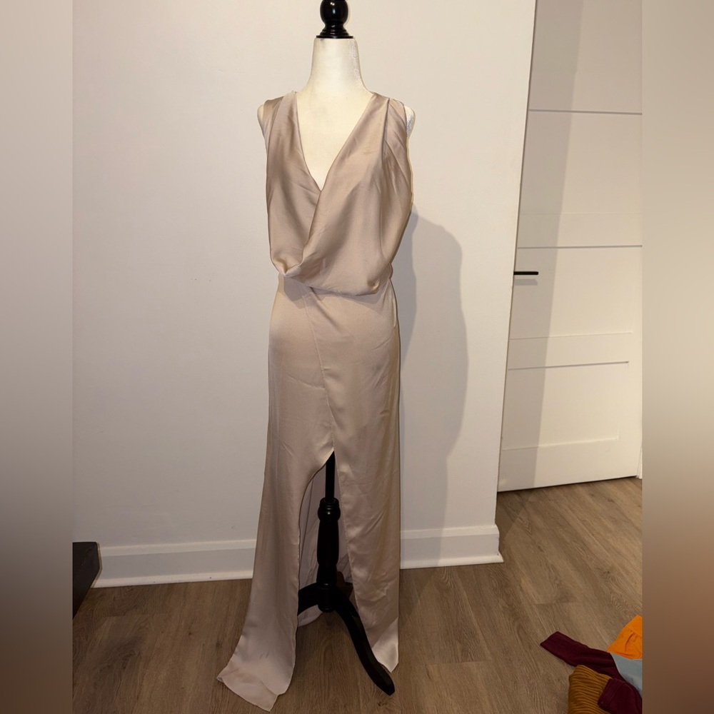 Elegant Cream Sleeveless Gown with Slit
